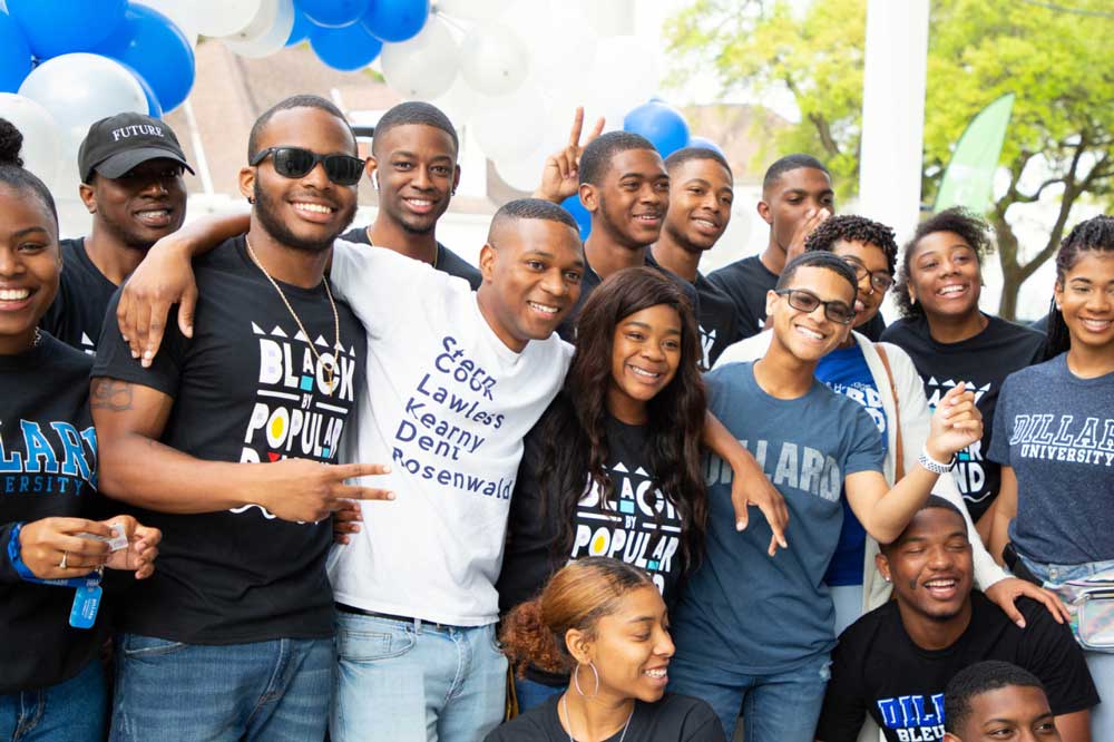 HBCU students posing together outside on campus
