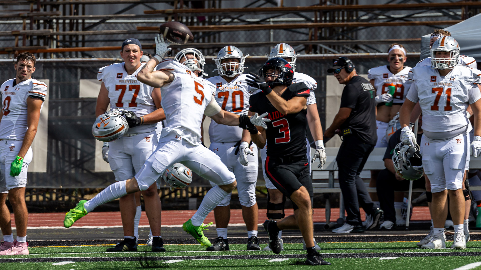 Christian Hansen breaks up a pass in 2025 against Southern Oregon.