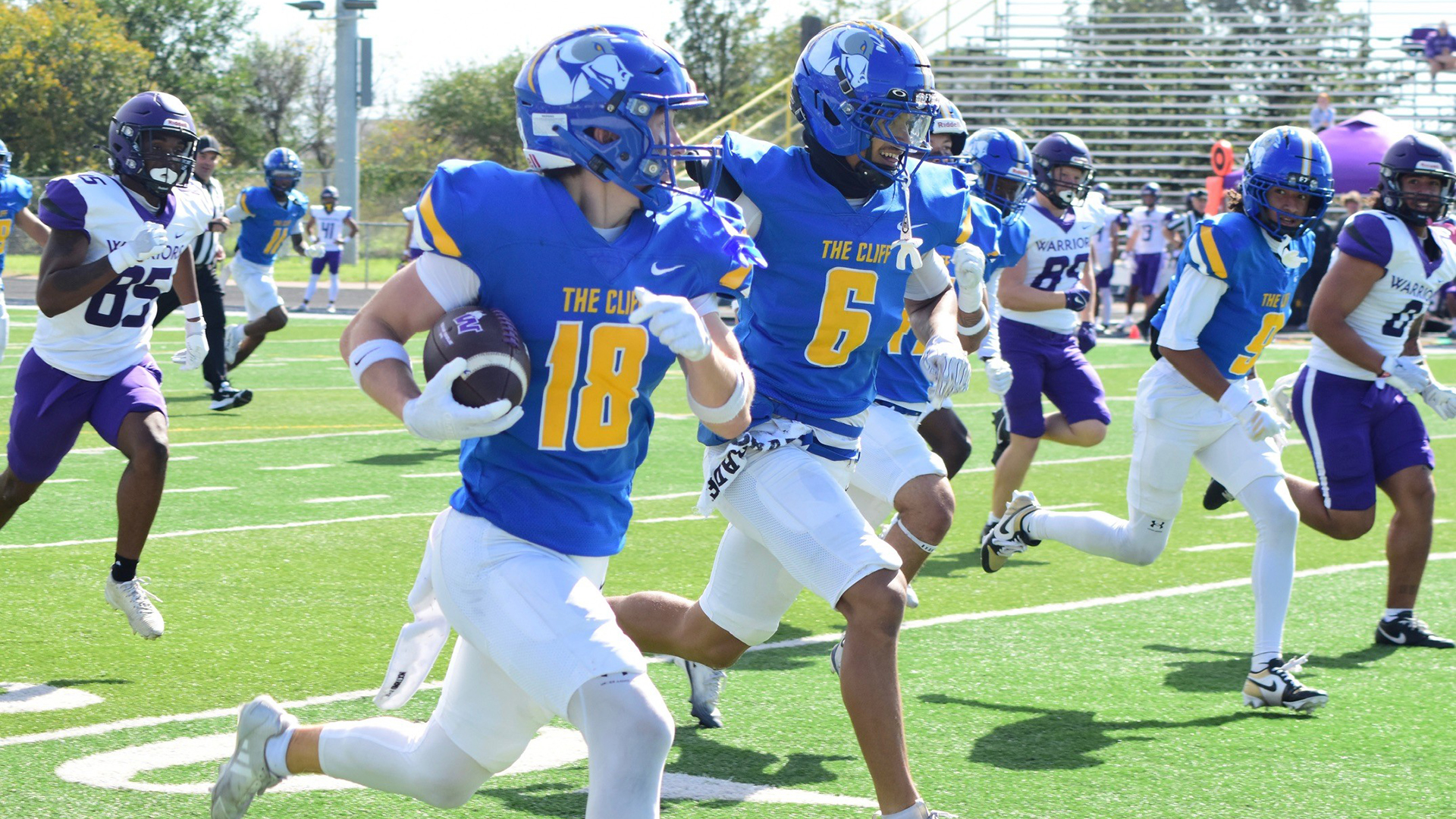 Cormyc Guerrero wears number 10 and runs in a touchdown for Briar Cliff.